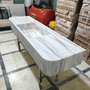 Hand Carved Carrara Marble Vessel Sink: Fluted Front, Rounded Corner