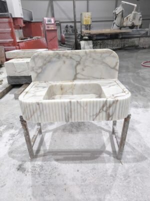Calacatta Gold Marble Sink: Fluted Stone Vanity with Backsplash