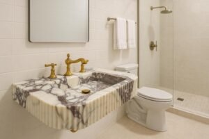 Monet Marble Sink – Carved Wall-Mount Vanity in Bold Purple Veined Stone