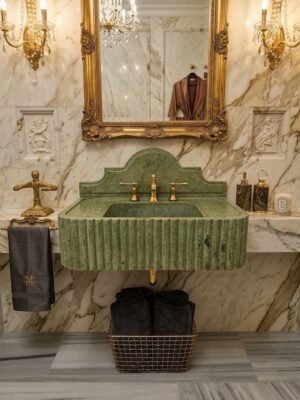 Green Marble Bathroom Sink with Fluted Apron and Decorative Backsplash